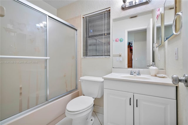 8250 NW 51st Ct, Lauderhill, FL 33351 - full bath with vanity, combined bath / shower with glass door, tile patterned flooring, and a textured wall
