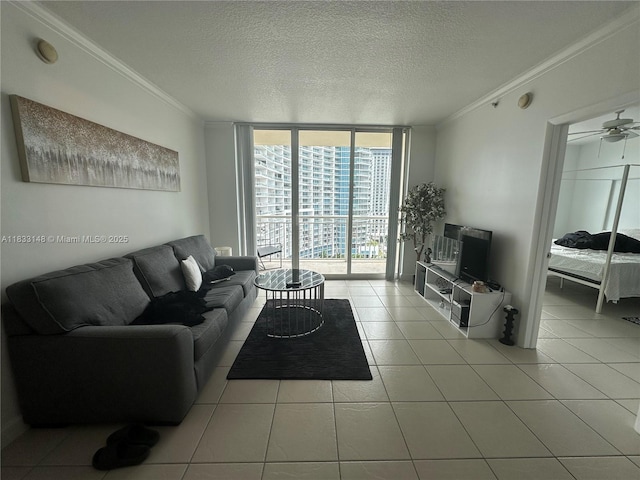 2000 N Bayshore Dr Unit 1505, Miami, FL 33137 - tiled living room with expansive windows, crown molding, a textured ceiling, and a ceiling fan