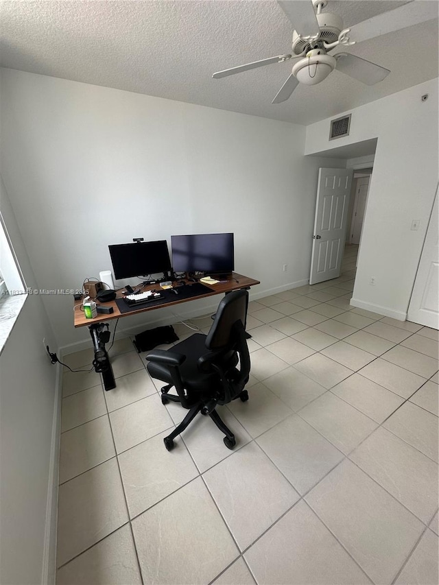 2000 N Bayshore Dr Unit 1505, Miami, FL 33137 - office space with light tile patterned floors, a textured ceiling, and a ceiling fan