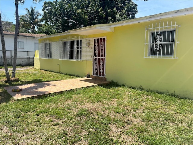 1825 NW 112th St, Miami, FL 33167 - view of front of home with stucco siding