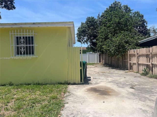 1825 NW 112th St, Miami, FL 33167 - view of property exterior featuring a patio area