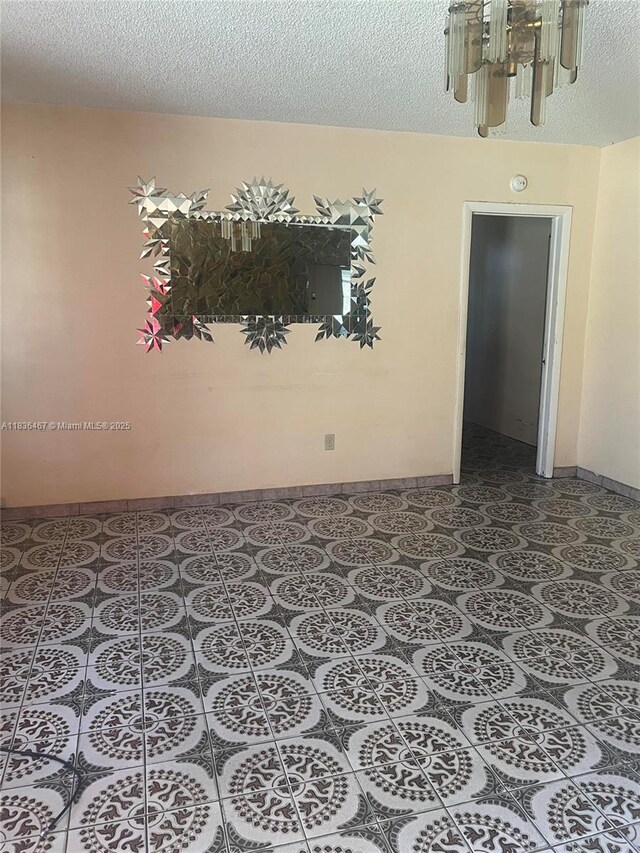 1825 NW 112th St, Miami, FL 33167 - empty room featuring baseboards and tile patterned floors