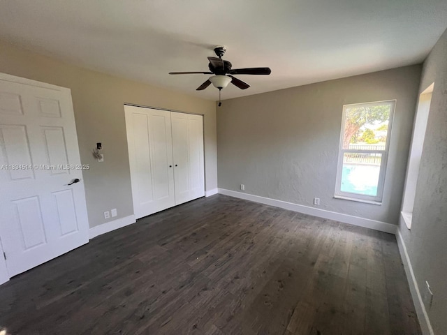 8924 47th Ct, Coral Springs, FL 33067 - unfurnished bedroom featuring dark wood-style flooring, a closet, and a ceiling fan