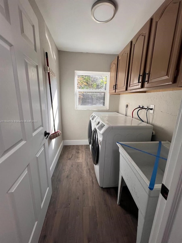 8924 47th Ct, Coral Springs, FL 33067 - laundry area with cabinet space, dark wood-style flooring, and separate washer and dryer