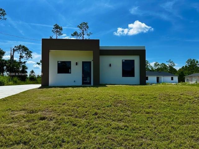 323 Mangonia Ave, Lehigh Acres, FL 33974 - photo 2