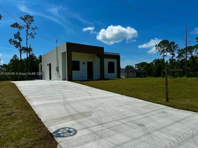 323 Mangonia Ave, Lehigh Acres, FL 33974 - photo 3