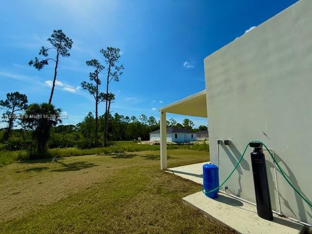 323 Mangonia Ave, Lehigh Acres, FL 33974 - photo 4