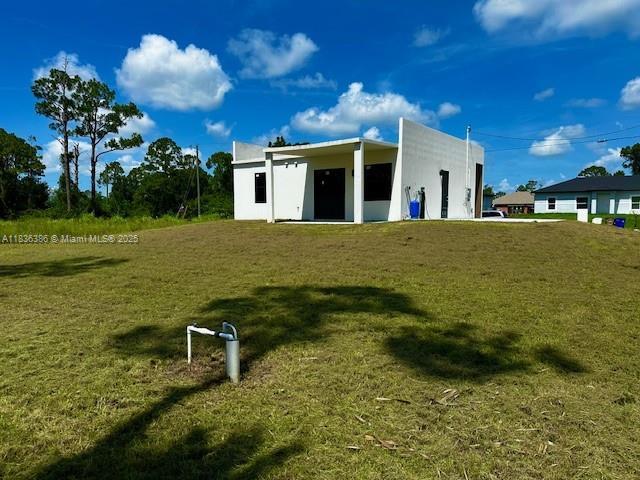323 Mangonia Ave, Lehigh Acres, FL 33974 - photo 6
