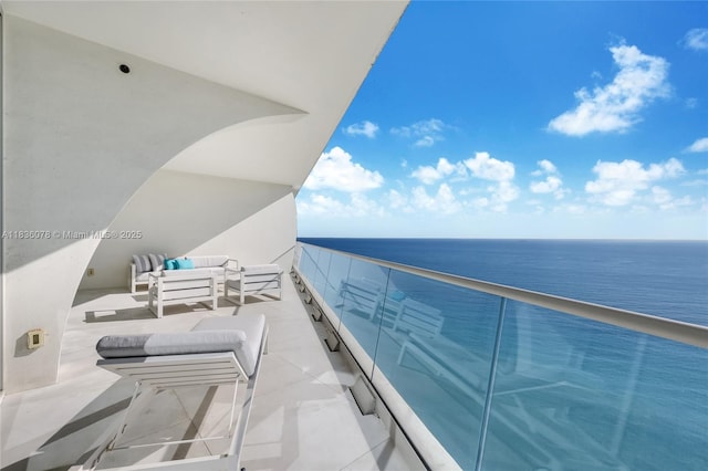 16901 Collins Ave Unit 2702, Sunny Isles Beach, FL 33160 - balcony featuring a water view and outdoor lounge area