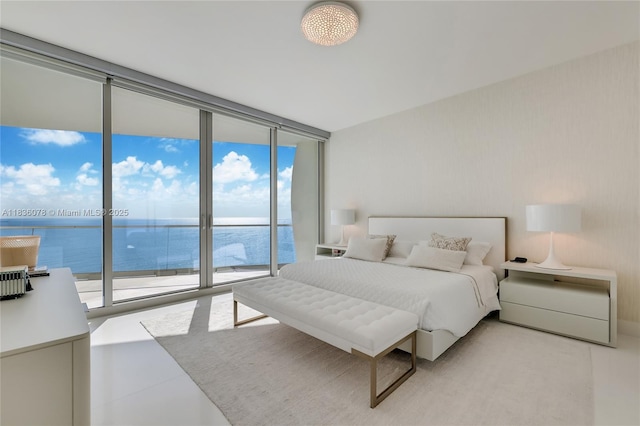 16901 Collins Ave Unit 2702, Sunny Isles Beach, FL 33160 - bedroom featuring access to outside, a wall of windows, and a water view