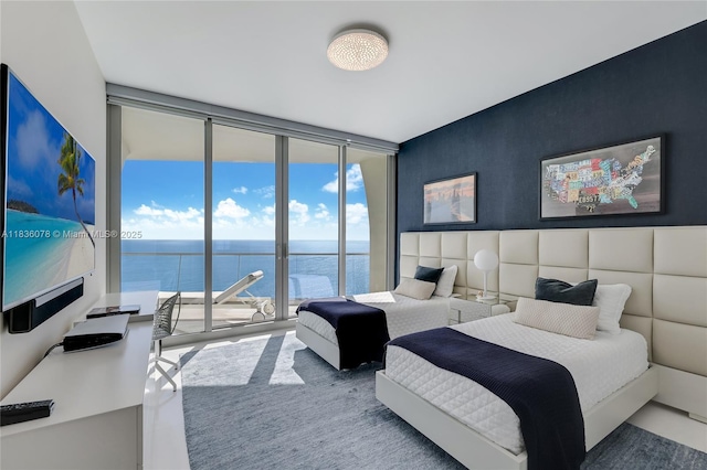 16901 Collins Ave Unit 2702, Sunny Isles Beach, FL 33160 - bedroom featuring floor to ceiling windows, access to exterior, and a water view