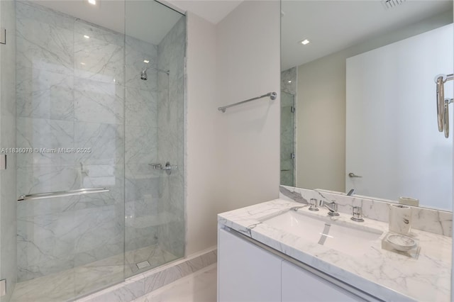 16901 Collins Ave Unit 2702, Sunny Isles Beach, FL 33160 - full bathroom featuring a marble finish shower, marble finish floors, vanity, and recessed lighting