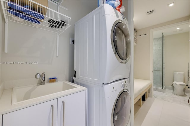 16901 Collins Ave Unit 2702, Sunny Isles Beach, FL 33160 - laundry area featuring stacked washer and clothes dryer