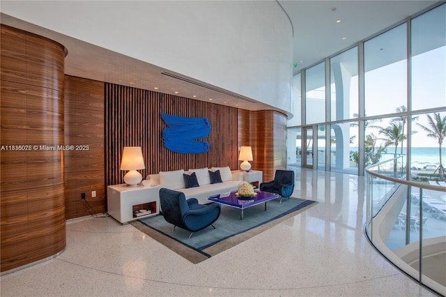 16901 Collins Ave Unit 2702, Sunny Isles Beach, FL 33160 - common area with expansive windows, a high ceiling, and wood walls