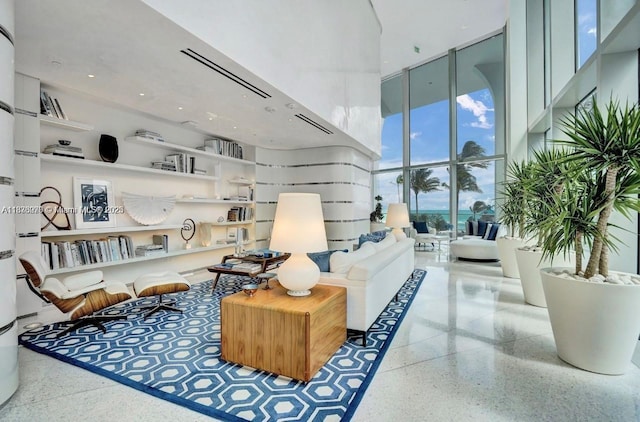 16901 Collins Ave Unit 2702, Sunny Isles Beach, FL 33160 - living room with a wall of windows and a towering ceiling