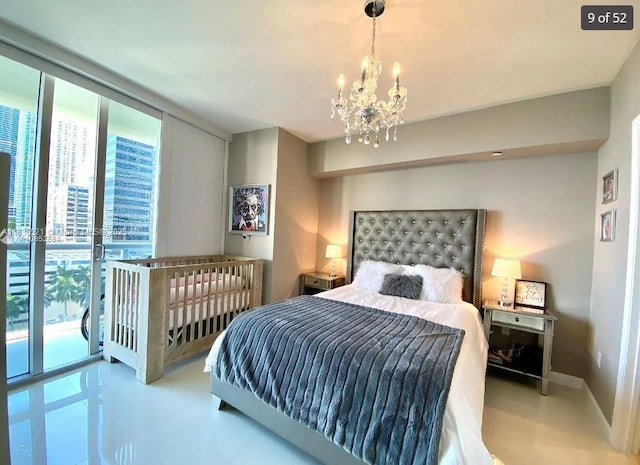 495 Brickell Ave Unit 1205, Miami, FL 33131 - bedroom featuring a chandelier