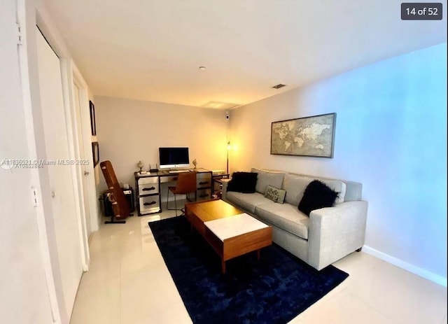 495 Brickell Ave Unit 1205, Miami, FL 33131 - living area with a desk and baseboards