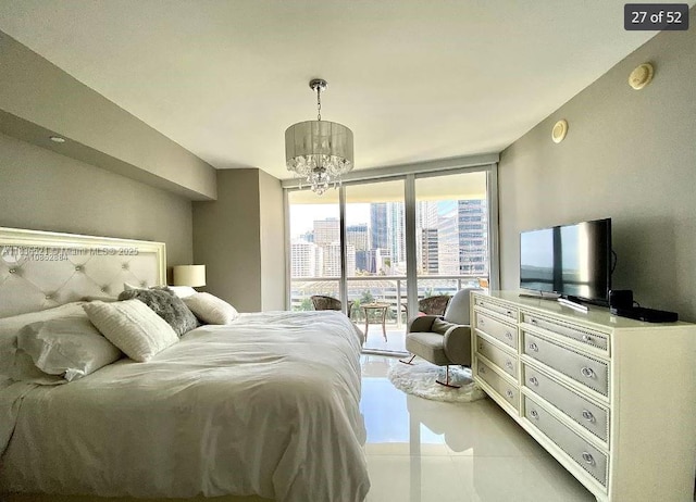 495 Brickell Ave Unit 1205, Miami, FL 33131 - bedroom featuring expansive windows, access to outside, a chandelier, and light tile patterned flooring