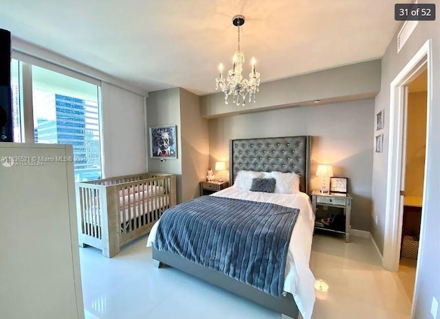 495 Brickell Ave Unit 1205, Miami, FL 33131 - bedroom featuring a chandelier