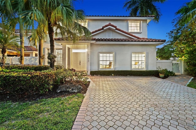 5194 NW 106th Ave, Doral, FL 33178 - mediterranean / spanish house with stucco siding and a tiled roof