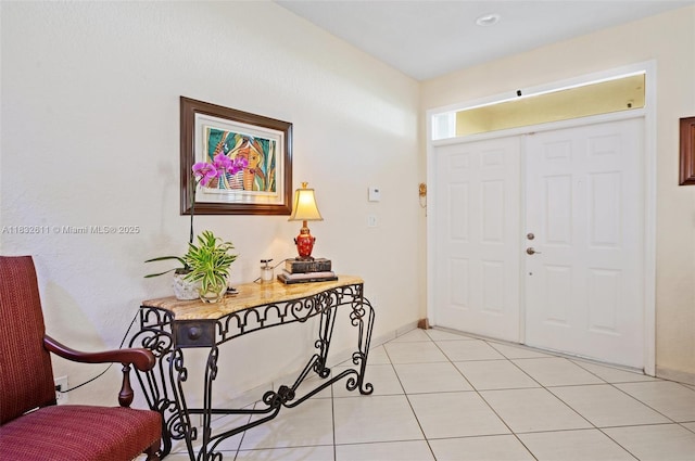 5194 NW 106th Ave, Doral, FL 33178 - foyer with light tile patterned floors and baseboards