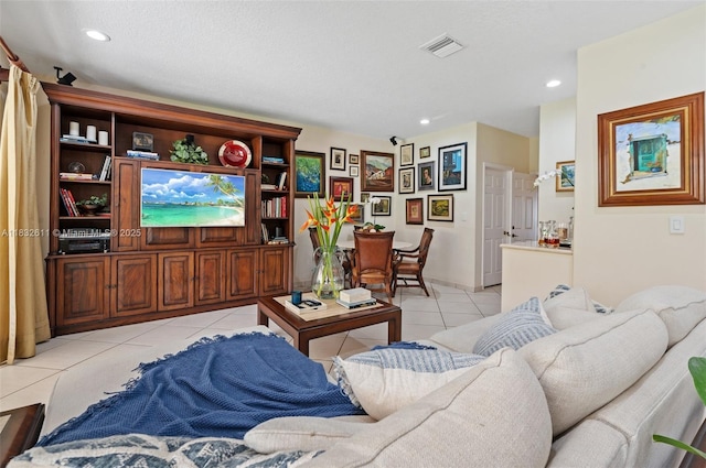 5194 NW 106th Ave, Doral, FL 33178 - living room featuring light tile patterned floors and recessed lighting