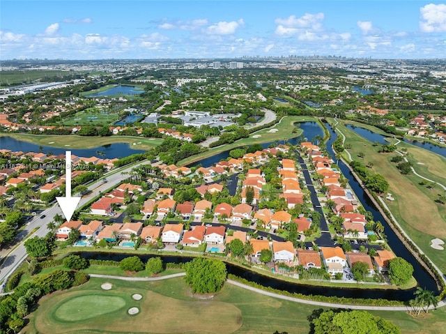 5194 NW 106th Ave, Doral, FL 33178 - aerial view of property's location featuring a golf course, nearby suburban area, and a large body of water