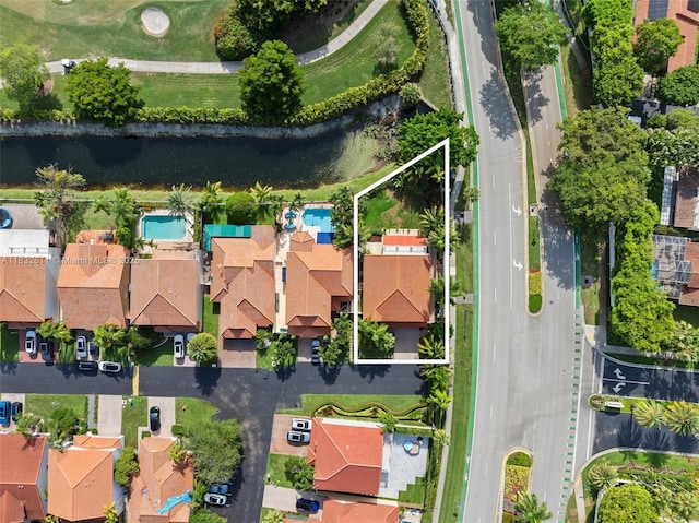 5194 NW 106th Ave, Doral, FL 33178 - aerial perspective of suburban area with property boundaries highlighted and a large body of water