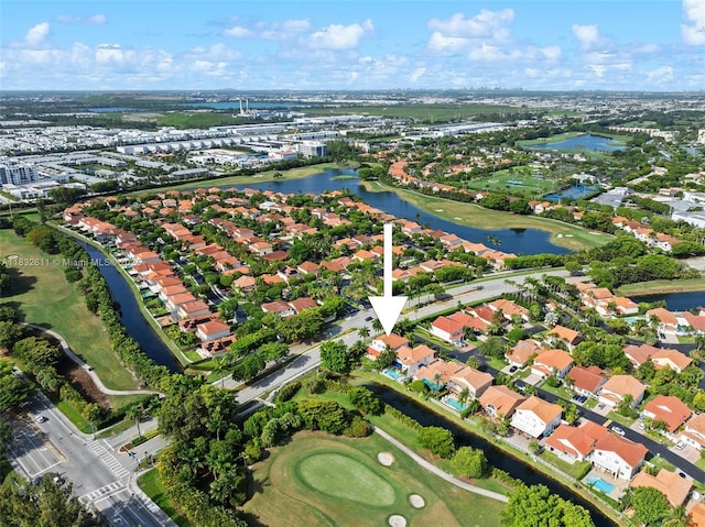 5194 NW 106th Ave, Doral, FL 33178 - aerial view of property and surrounding area featuring a large body of water and nearby suburban area