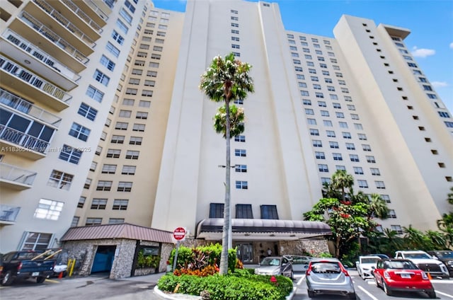 11111 Biscayne Blvd Unit 2100, Miami, FL 33181 - view of apartment building / complex featuring uncovered parking