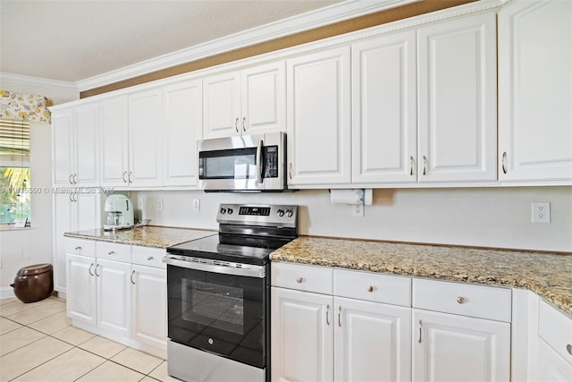 15376 NW 14th Mnr, Pembroke Pines, FL 33028 - kitchen featuring stainless steel appliances, crown molding, white cabinets, light tile patterned floors, and light stone countertops
