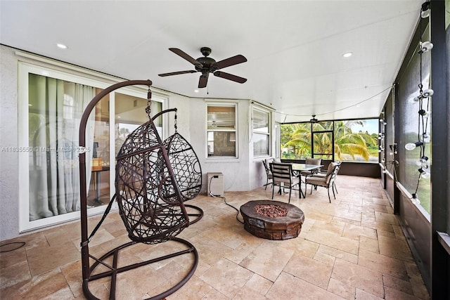 15376 NW 14th Mnr, Pembroke Pines, FL 33028 - sunroom / solarium featuring an outdoor fire pit, ceiling fan, and outdoor dining area