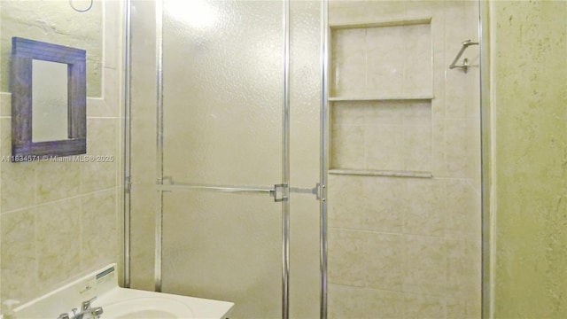 841 NE 139th St, North Miami, FL 33161 - bathroom featuring a stall shower and a sink