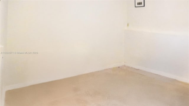 841 NE 139th St, North Miami, FL 33161 - empty room with light colored carpet