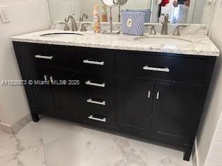 10441 Mahogany Key Cir Unit 202, Miami, FL 33196 - bathroom with double vanity and marble finish flooring