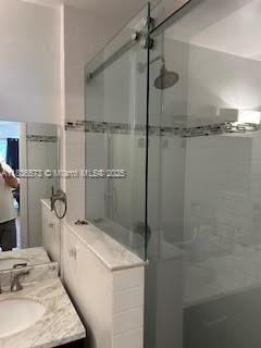 10441 Mahogany Key Cir Unit 202, Miami, FL 33196 - bathroom featuring vanity and a shower stall