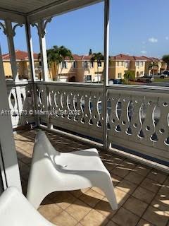 10441 Mahogany Key Cir Unit 202, Miami, FL 33196 - balcony featuring a residential view