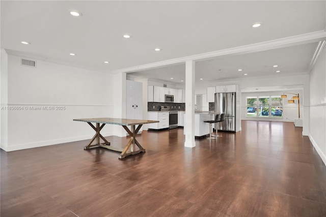 4721 W Park Rd, Hollywood, FL 33021 - living area featuring crown molding, recessed lighting, and dark wood-type flooring