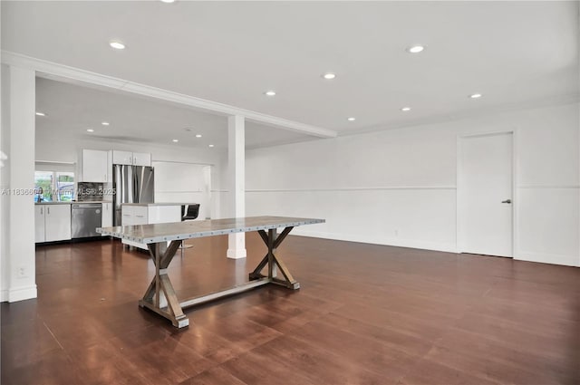 4721 W Park Rd, Hollywood, FL 33021 - kitchen featuring appliances with stainless steel finishes, white cabinetry, dark wood-type flooring, recessed lighting, and light countertops