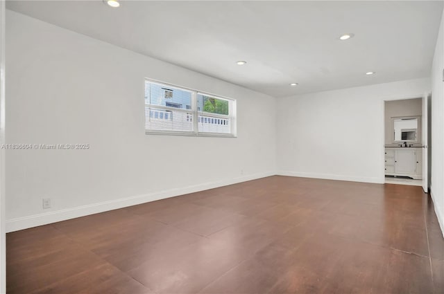 4721 W Park Rd, Hollywood, FL 33021 - spare room featuring recessed lighting and baseboards