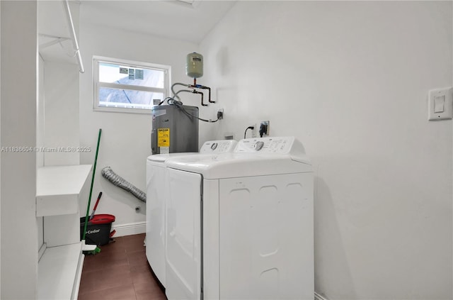 4721 W Park Rd, Hollywood, FL 33021 - laundry area featuring separate washer and dryer, water heater, and dark tile patterned flooring