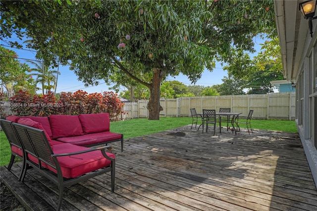 4721 W Park Rd, Hollywood, FL 33021 - wooden terrace with outdoor lounge area, a fenced backyard, and outdoor dining area