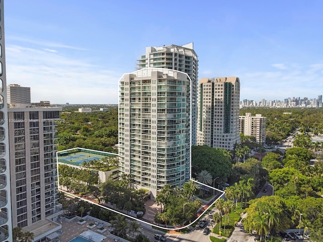 2645 S Bayshore Dr Unit 304, Miami, FL 33133 - view of building exterior featuring a skyline view