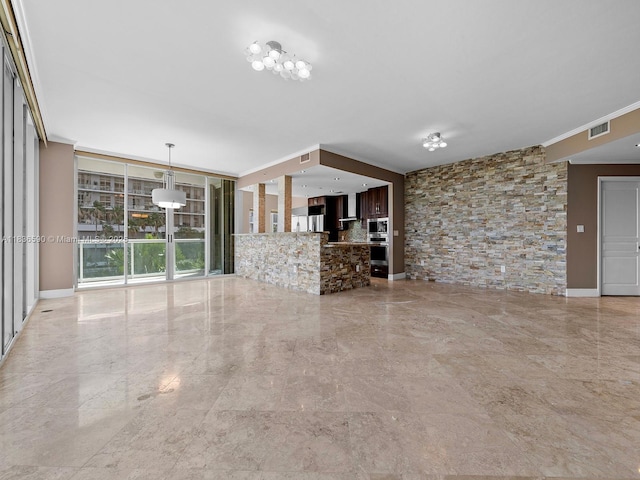 2645 S Bayshore Dr Unit 304, Miami, FL 33133 - unfurnished living room with ornamental molding