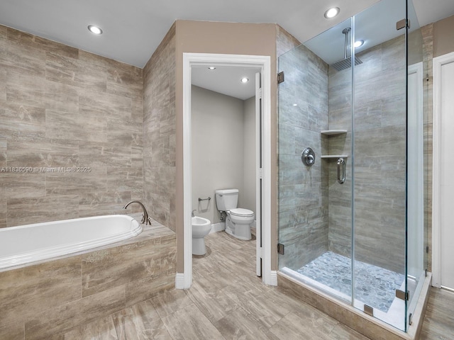 2645 S Bayshore Dr Unit 304, Miami, FL 33133 - bathroom with a shower stall, a garden tub, a bidet, and recessed lighting