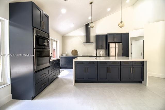 10204 Caracas St, Cooper City, FL 33026 - kitchen with appliances with stainless steel finishes, wall chimney exhaust hood, high vaulted ceiling, light countertops, and decorative light fixtures