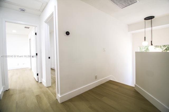 10204 Caracas St, Cooper City, FL 33026 - hallway featuring light wood-style flooring and attic access