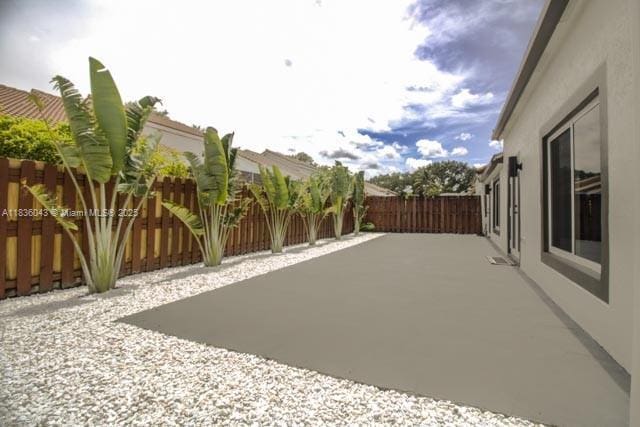 10204 Caracas St, Cooper City, FL 33026 - fenced backyard featuring a patio area
