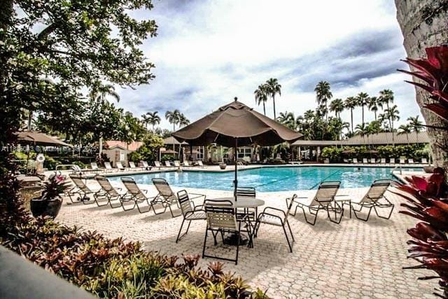 10204 Caracas St, Cooper City, FL 33026 - community pool featuring a patio area