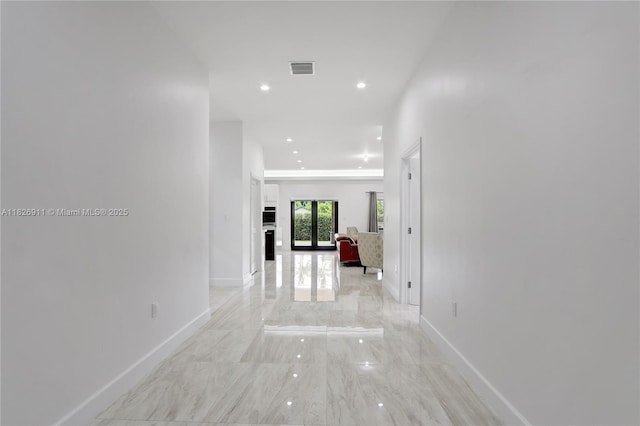 7970 SW 26th St, Miami, FL 33155 - hall featuring light marble finish floors and recessed lighting